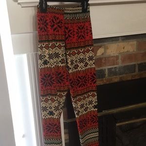 Red, orange, cream patterned leggings
